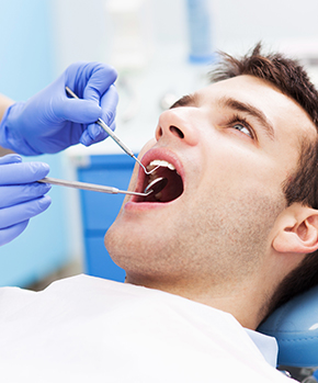 man receiving dental work