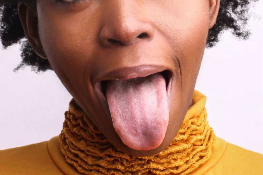 woman sticks out her tongue