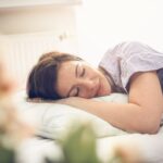woman recovering after dental implant, dental implant aftercare
