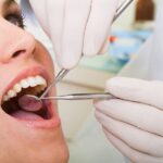 oral cancer screening, woman in dental chair